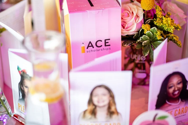 ACE Scholarships branding and pledge cards at Denver nonprofit fundraising luncheon