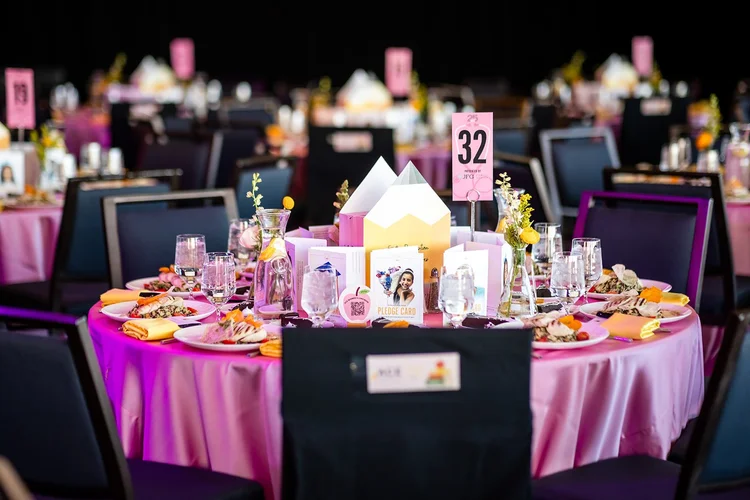 Pink and gold table settings at ACE Scholarships Women's Luncheon Seawell Ballroom Denver