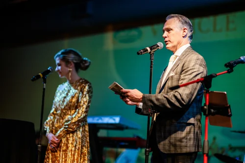 Candid holiday party moment Colorado event photographer Vehicle Vault Parker