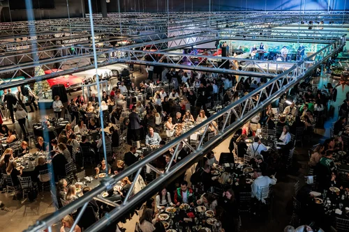 Guests mingling at corporate holiday party Parker Colorado event photographer