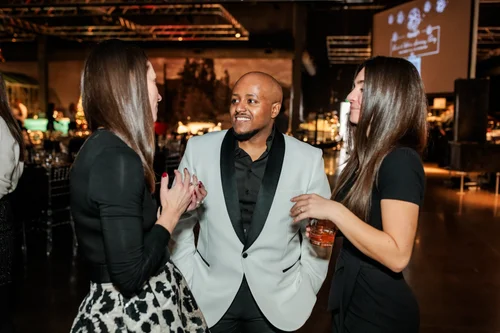 Corporate holiday party program at Vehicle Vault Parker Colorado event photography