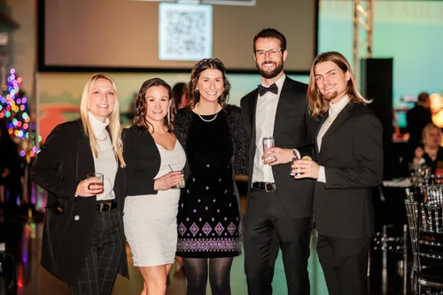 Group photo at corporate holiday party Vehicle Vault Parker Colorado event photographer