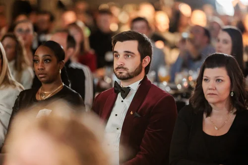 Corporate team mingling at holiday party Vehicle Vault Parker Colorado