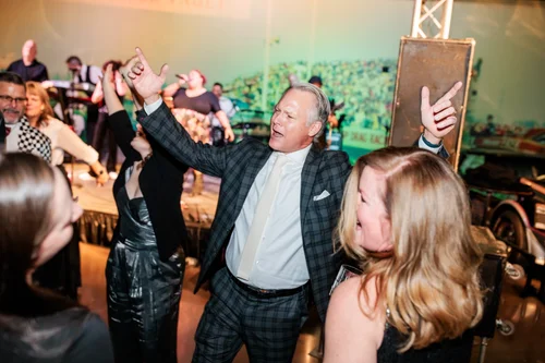 Guests socializing at corporate holiday party Parker Colorado