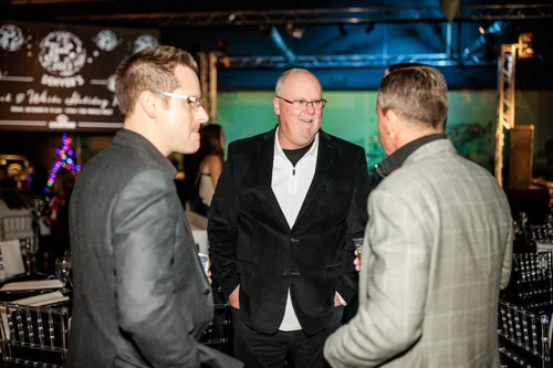 Guests at Vehicle Vault Parker Colorado corporate holiday party