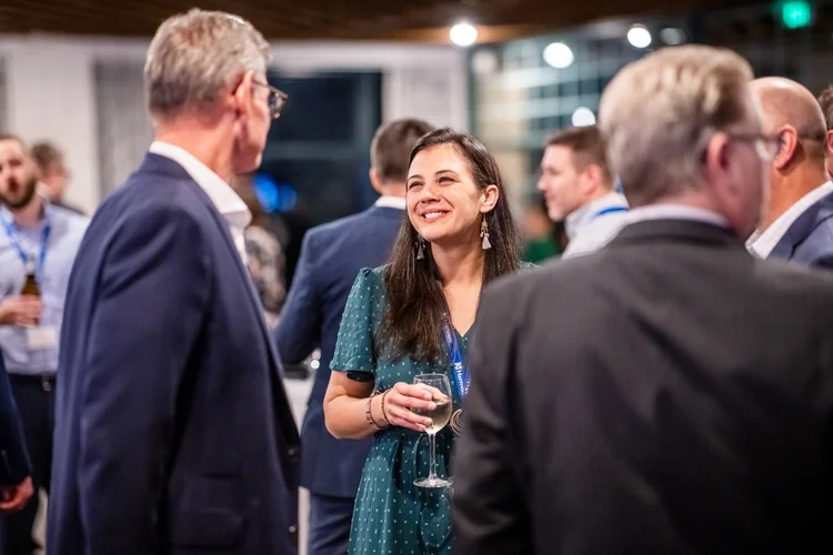Award recipient on stage at corporate event photography Englewood Colorado