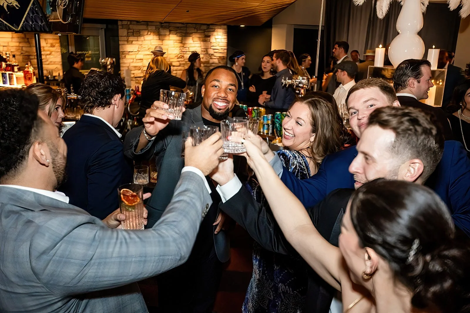 Corporate holiday party event photography at Empower Field Mile High Denver Colorado