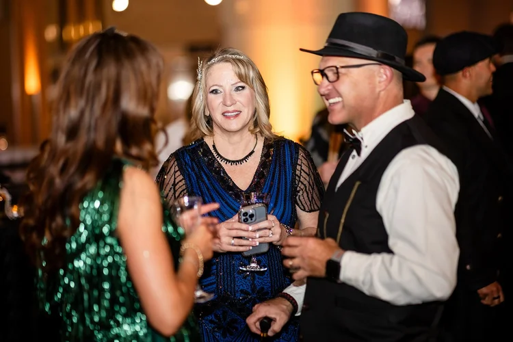 Denver event photographer at Mile High Stadium corporate holiday party Denver Colorado