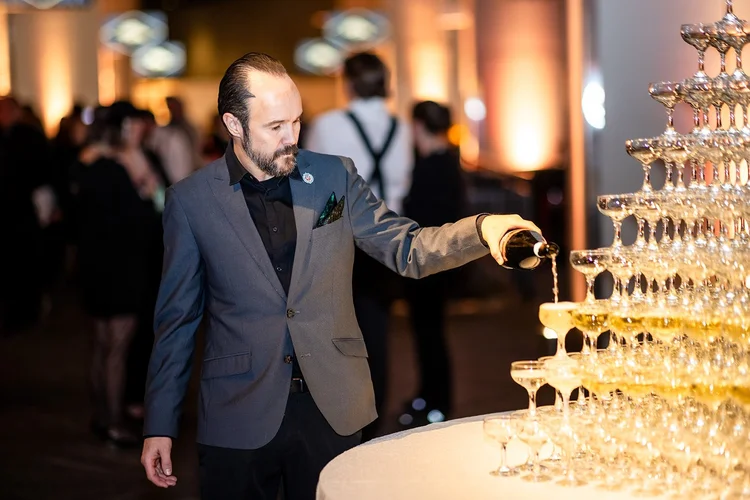 Empower Field at Mile High corporate event photography Denver Broncos holiday party