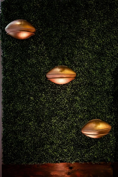 Corporate holiday party event photography at Empower Field Mile High Denver Colorado