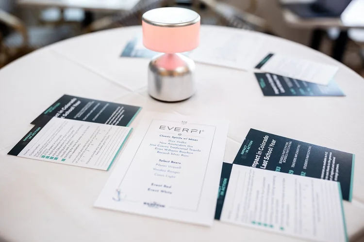 Event detail table cards EVERFI Impact in Action corporate networking Denver Colorado
