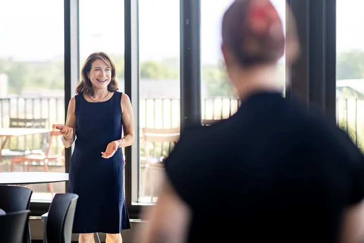 Speaker welcoming interns at University of Denver networking event Denver Colorado