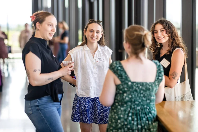 Welcome address at University of Denver intern networking event photography
