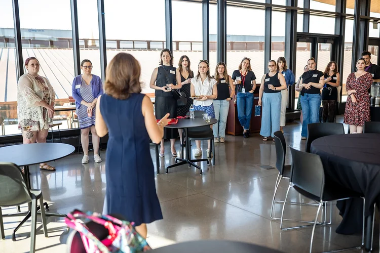 Group of interns networking at University of Denver event photography Denver Colorado